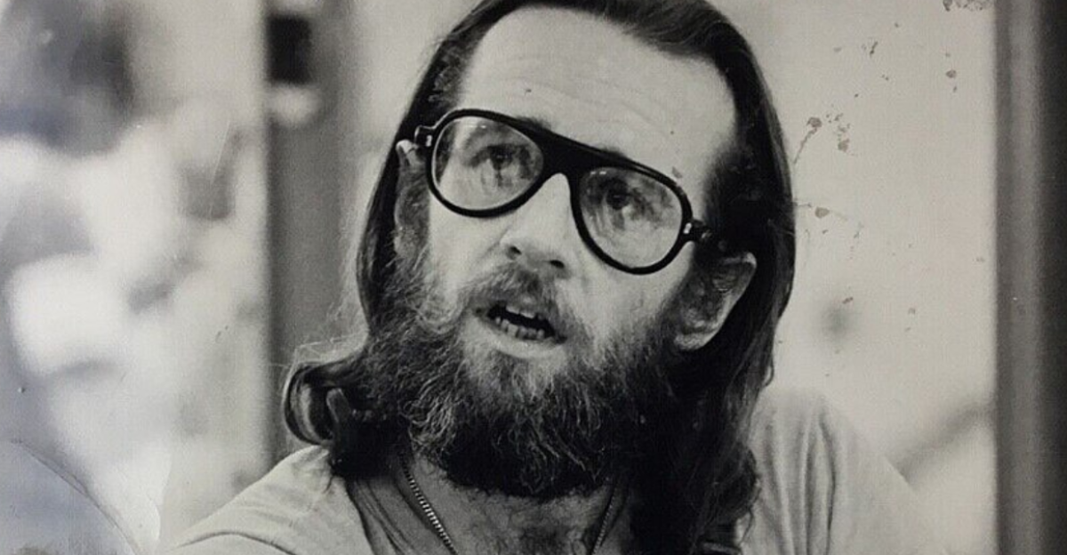 Portrait photograph of George Carlin, c. 1972