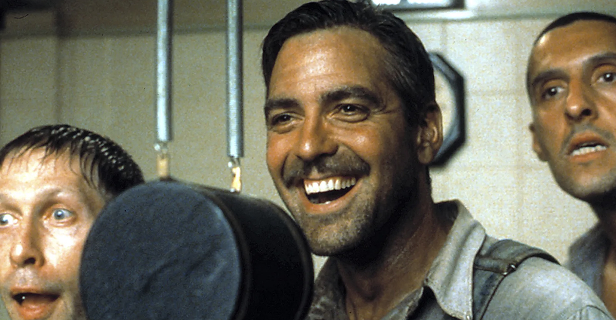 George Clooney, John Turturro, and Tim Blake Nelson singing into an old microphone