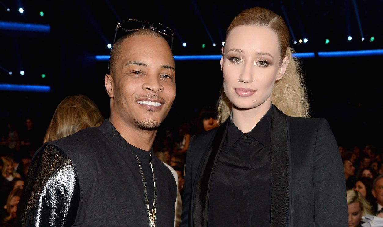 Rappers T.I. and Iggy Azalea (R) attend the 2014 American Music Awards at Nokia Theatre L.A. Live on November 23, 2014 in Los Angeles, California. 
