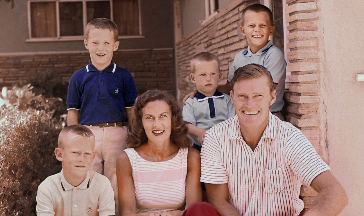 Actor Chuck Connors at home with his wife Elizabeth Jane Riddell Connors and their four sons Michael Connors, Jeffrey Connors, Stephen Connors, and Kevin Connors in 1957. 