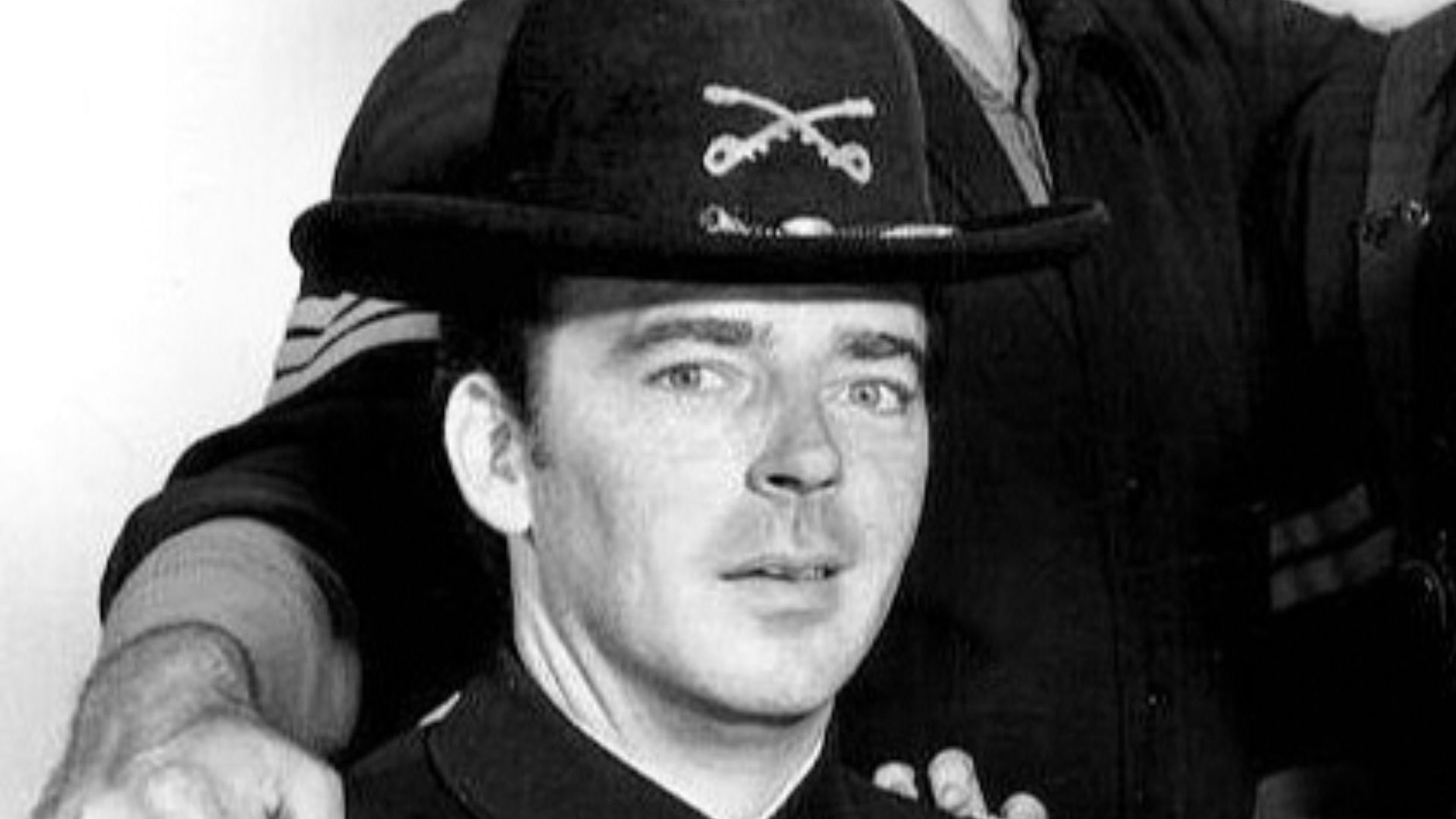 Main cast photo from the television program F Troop.  Standing from left: Forrest Tucker and Larry Storch. Seated: Ken Berry and Melody Patterson.