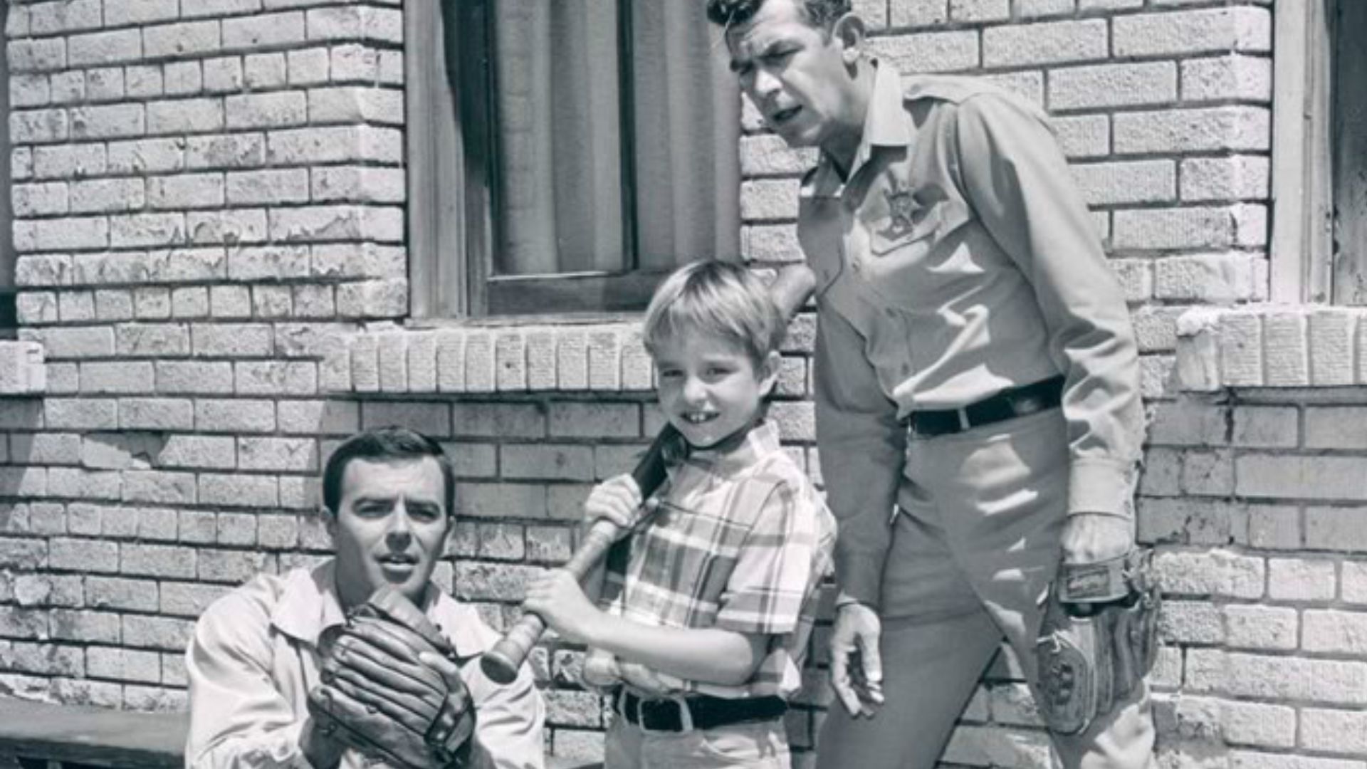 Publicity photo from the television program Mayberry R.F.D.  Pictured are Ken Berry (Sam Jones), Buddy Foster (Mike Jones), and Andy Griffith (Sheriff Andy Taylor).