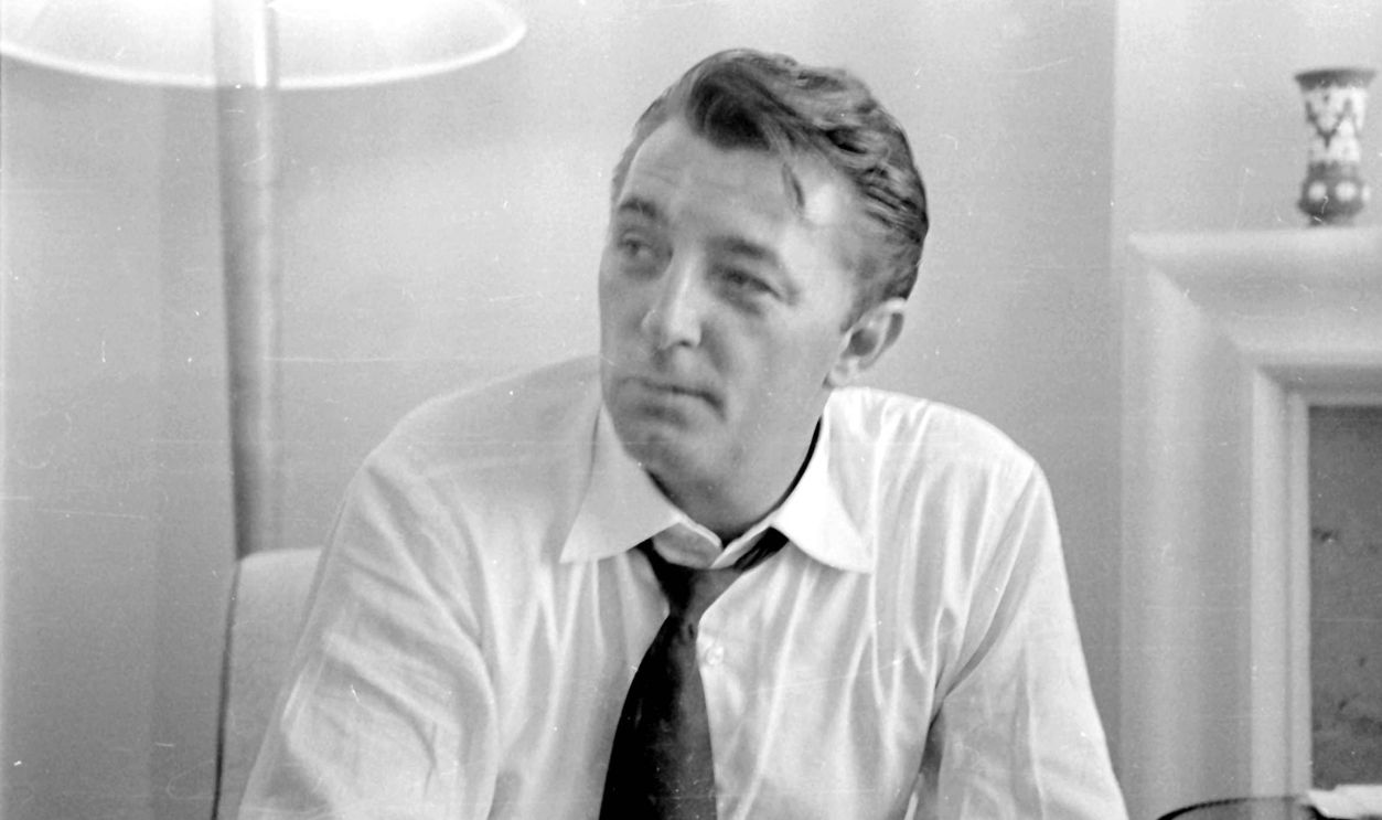 Actor Robert Mitchum during a press interview in London. July 1955. 