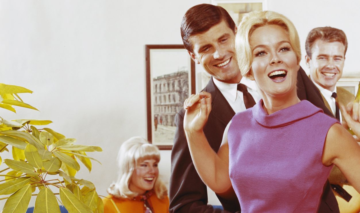 Friends having fun at party, smiling