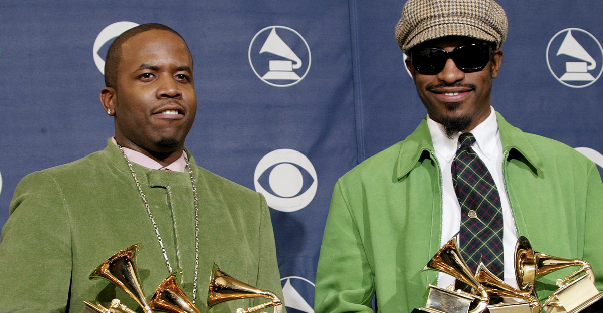 Musical Artists Big Boi (left) and Andre 3000 of Oukast pose with their six Grammys backstage in the Pressroom at the 46th Annual Grammy Awards.
