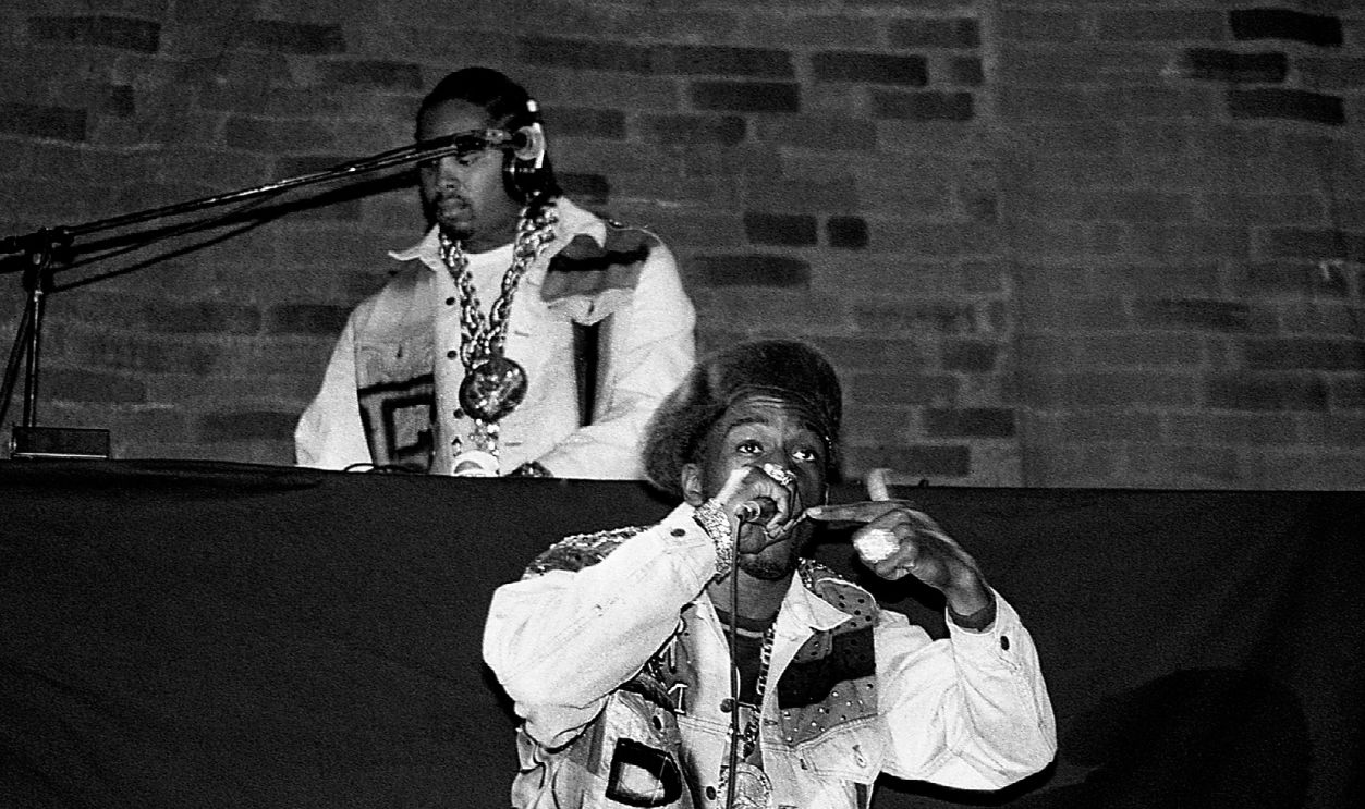 DJ Eric B. (rear) and rapper Rakim of Eric B. & Rakim performs at the International Amphitheatre in Chicago, Illinois in April 1990.