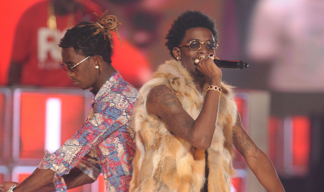 Rappers Young Thug (L) and Rich Homie Quan perform onstage during the BET Hip Hop Awards 2014 at Boisfeuillet Jones Atlanta Civic Center on September 20, 2014 in Atlanta, Georgia.