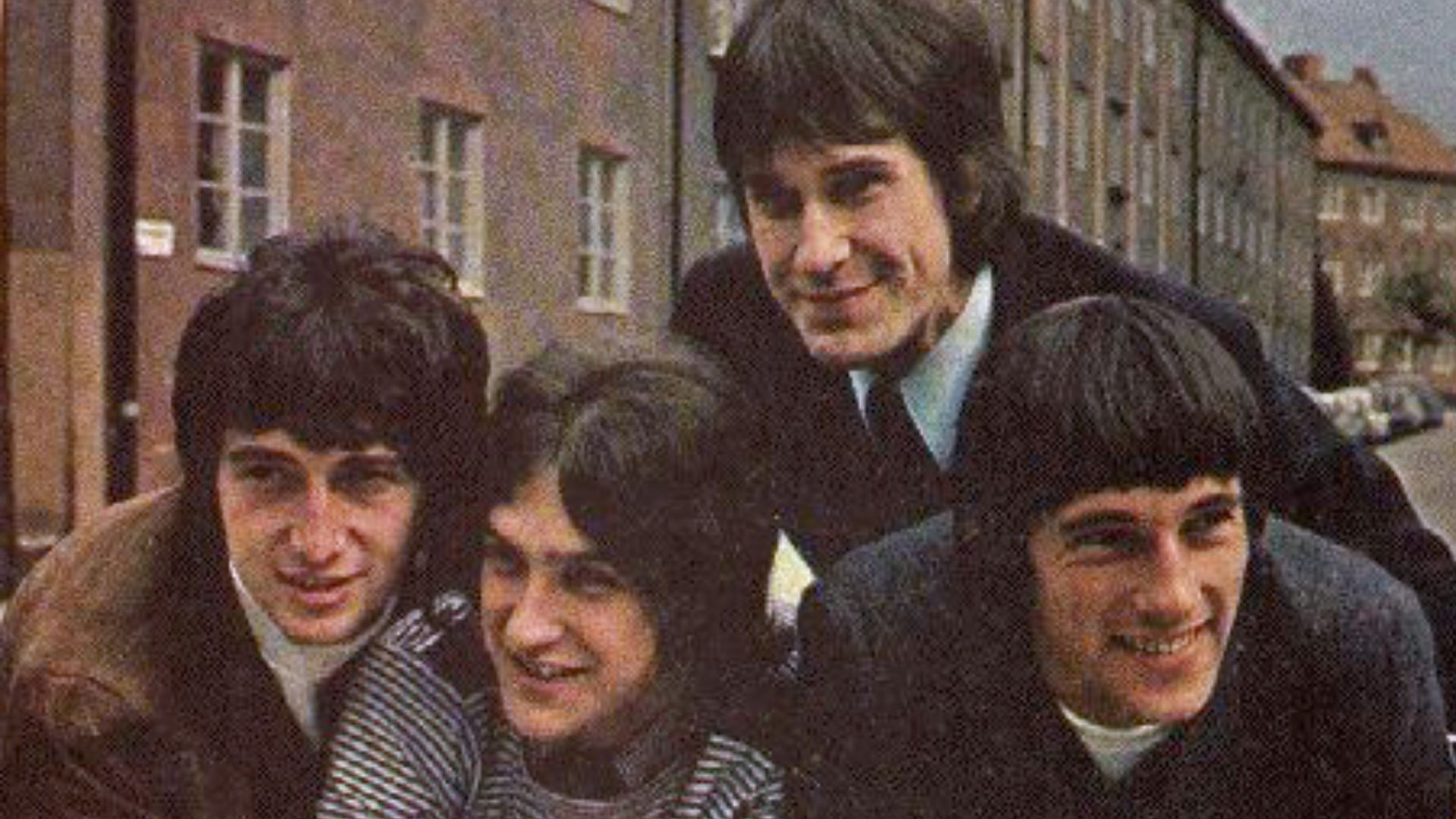 A promotional photo of British rock group The Kinks, taken in Stockholm, Sweden, ca. 2 September 1965 (see The Kinks: All Day and All of the Night : Day-By-Day Concerts, Recordings and Broadcasts, 1961-1996, p. 65). From left to right: Pete Quaife, Dave Davies, Ray Davies, Mick Avory (the band's lineup Feb 1964–June 1966, Nov 1966–Mar 1969).