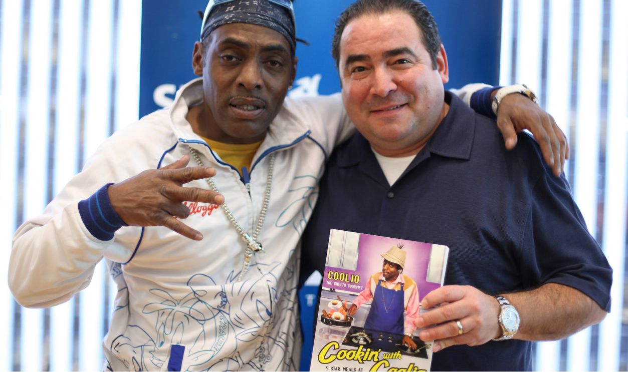 (L-R) Recording artist Coolio and chef Emeril Lagasse pose for a photograph before a recording of