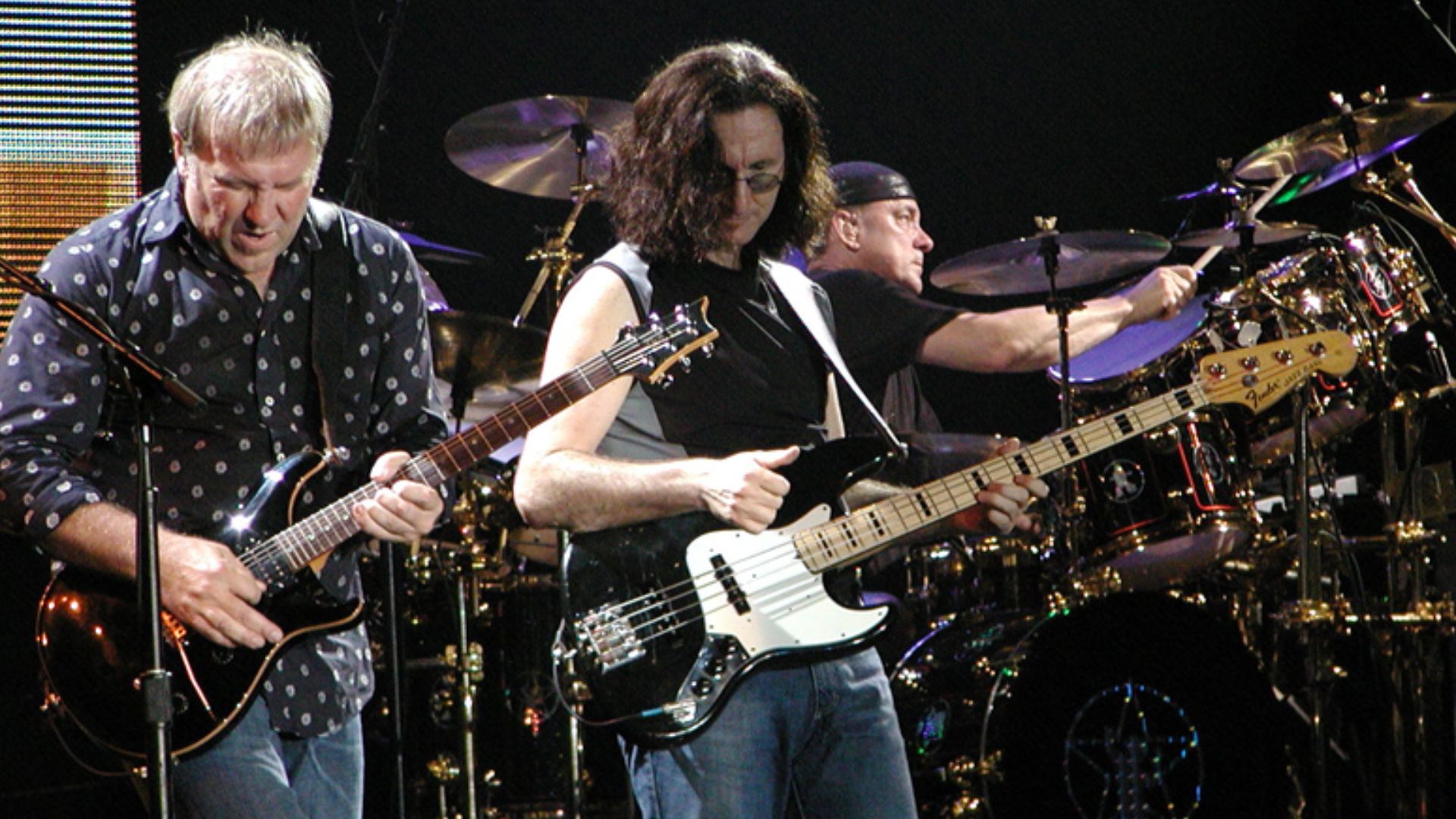 File:Rush-in-concert.jpg
