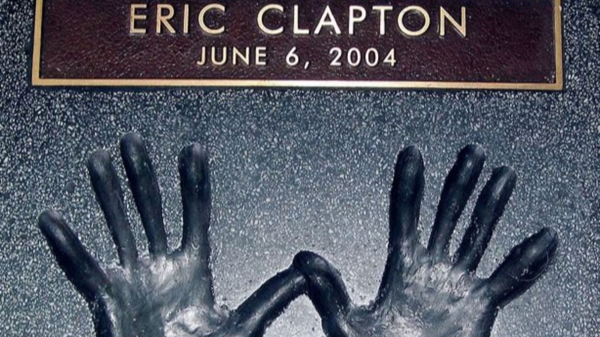 This is a photograph of Eric Clapton's Rock Walk Introduction / Award in Hollywood, CA.
