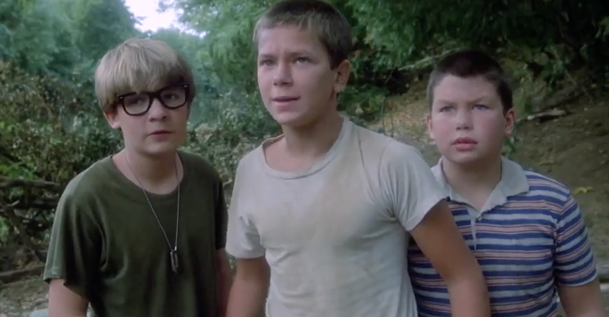 Three child actors in the forest, in Stand by Me