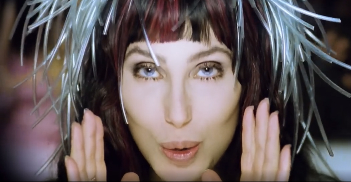 Screenshot of Cher in the Believe music video.