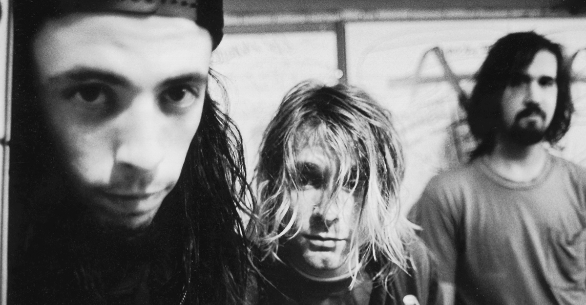 Photo of NIRVANA; L-R: Dave Grohl, Kurt Coabin, Krist Novoselic - posed, group shot.