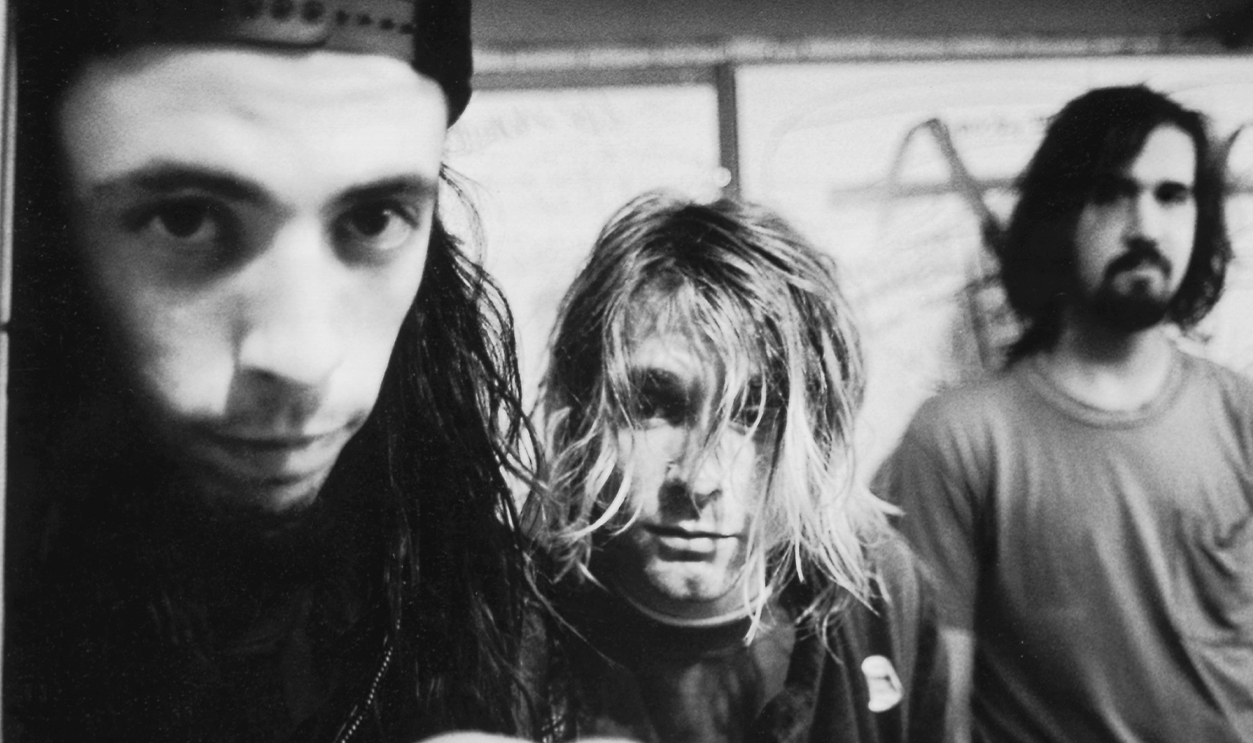 Photo of NIRVANA; L-R: Dave Grohl, Kurt Coabin, Krist Novoselic - posed, group shot.