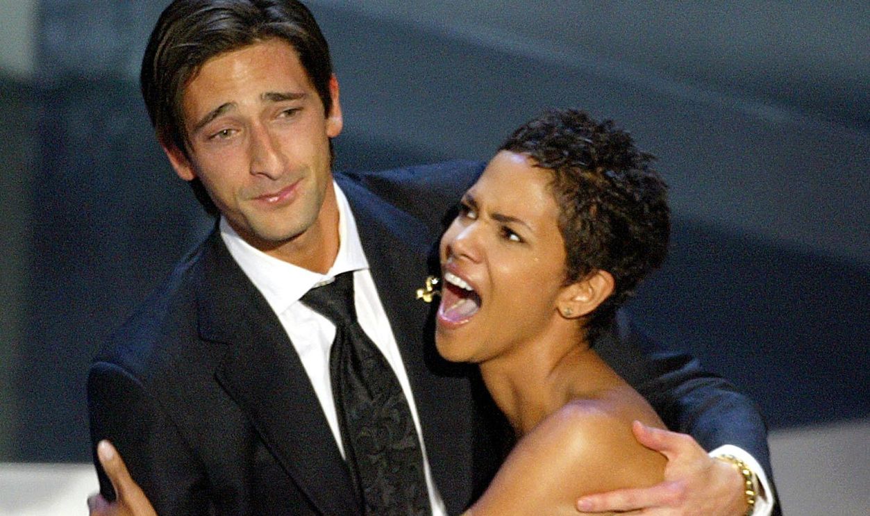 1931509655 Brody hugs presenter actress Halle Berry