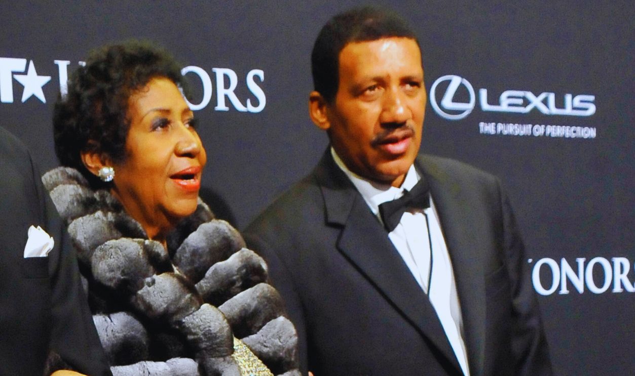 Gettyimages  - 467913839, BET Honors 2014: Arrivals WASHINGTON, DC - FEBRUARY 08: (L-R) William Wilkerson, singer Aretha Franklin, and Edward Franklin attend BET Honors 2014 at Warner Theatre on February 8, 2014 in Washington, DC.
