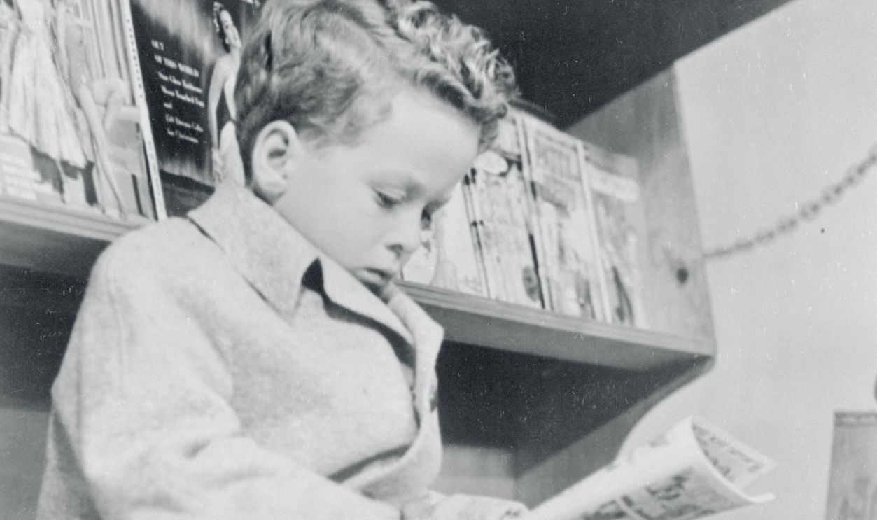 Getty Images - 517717590 - Child actor Rusty Hamer Reading Magazine, who starred as the son of Danny Thomas on the 1953-65 television series Make Room for Daddy.