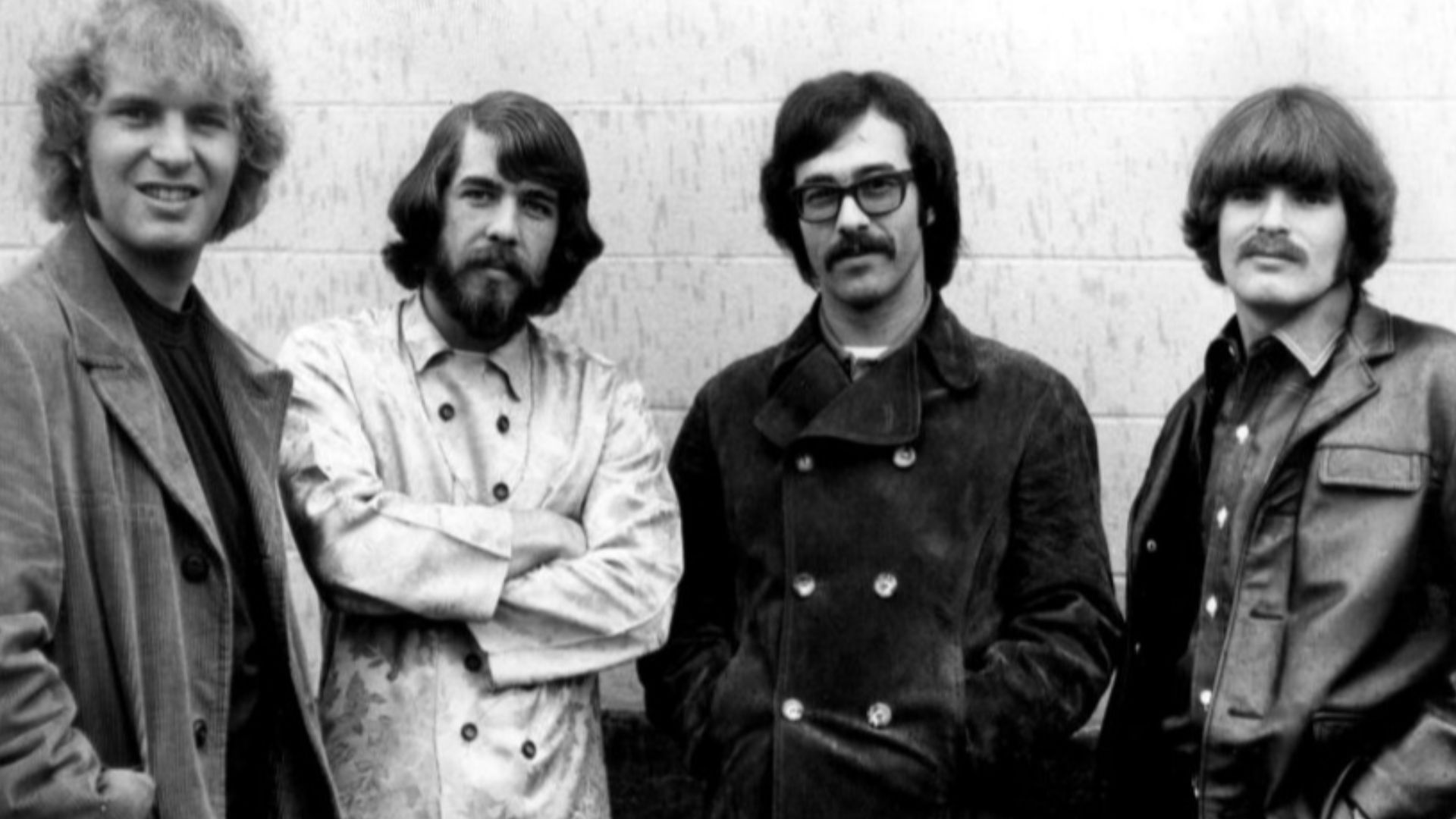 Photograph of Creedence Clearwater Revival (1968). L-R: Tom Fogerty, Doug Clifford, Stu Cook, and John Fogerty.