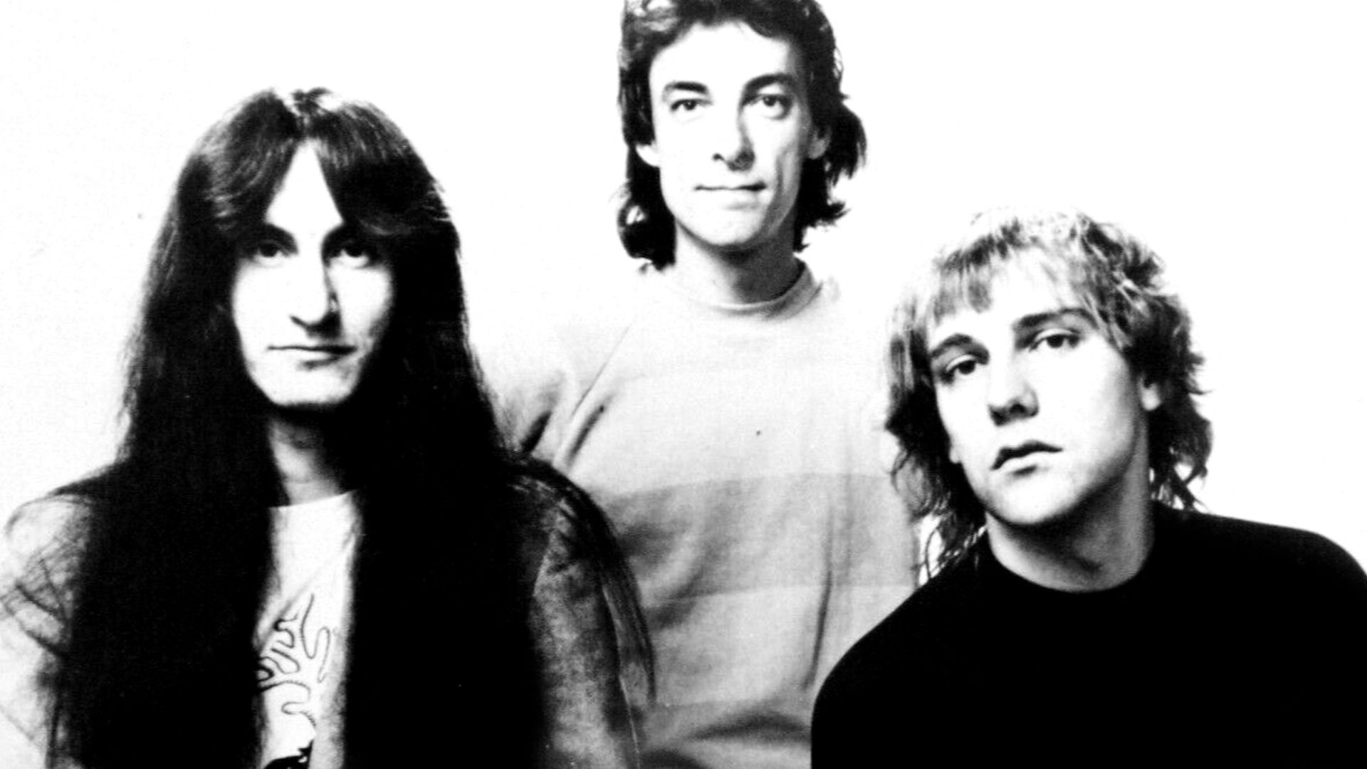 Promotional press photo of Canadian rock band Rush.
