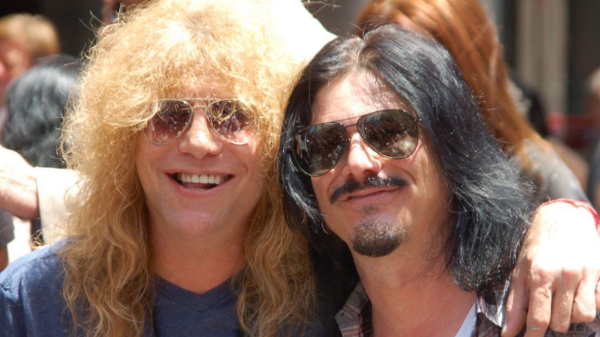 Steven Adler and Gilby Clarke at a ceremony for Slash to receive a star on the Hollywood Walk of Fame.