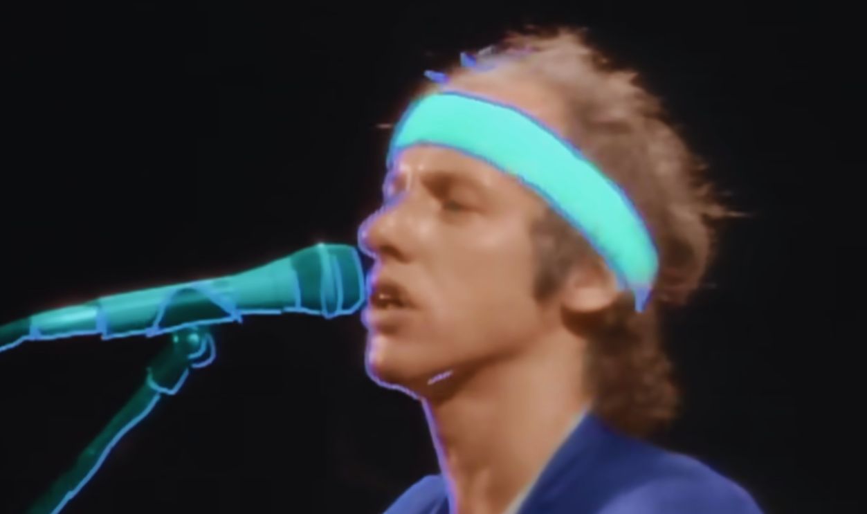 Screenshot from Money for Nothing (1985)