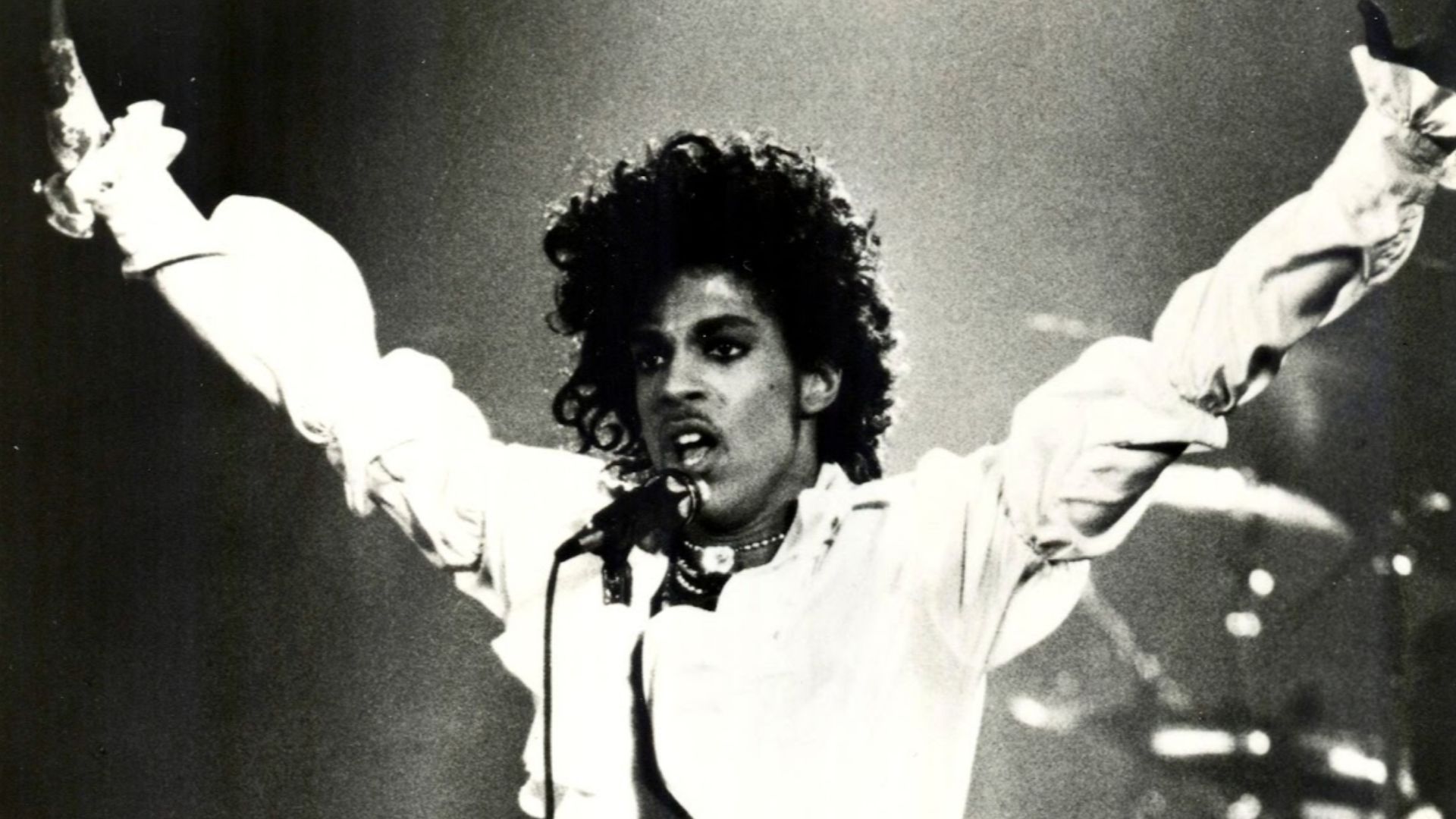 The American musician Prince in a press photo dated to 1984. No copyright markings on the photo and no registration for this photo could be found in the US Copyright Registry.