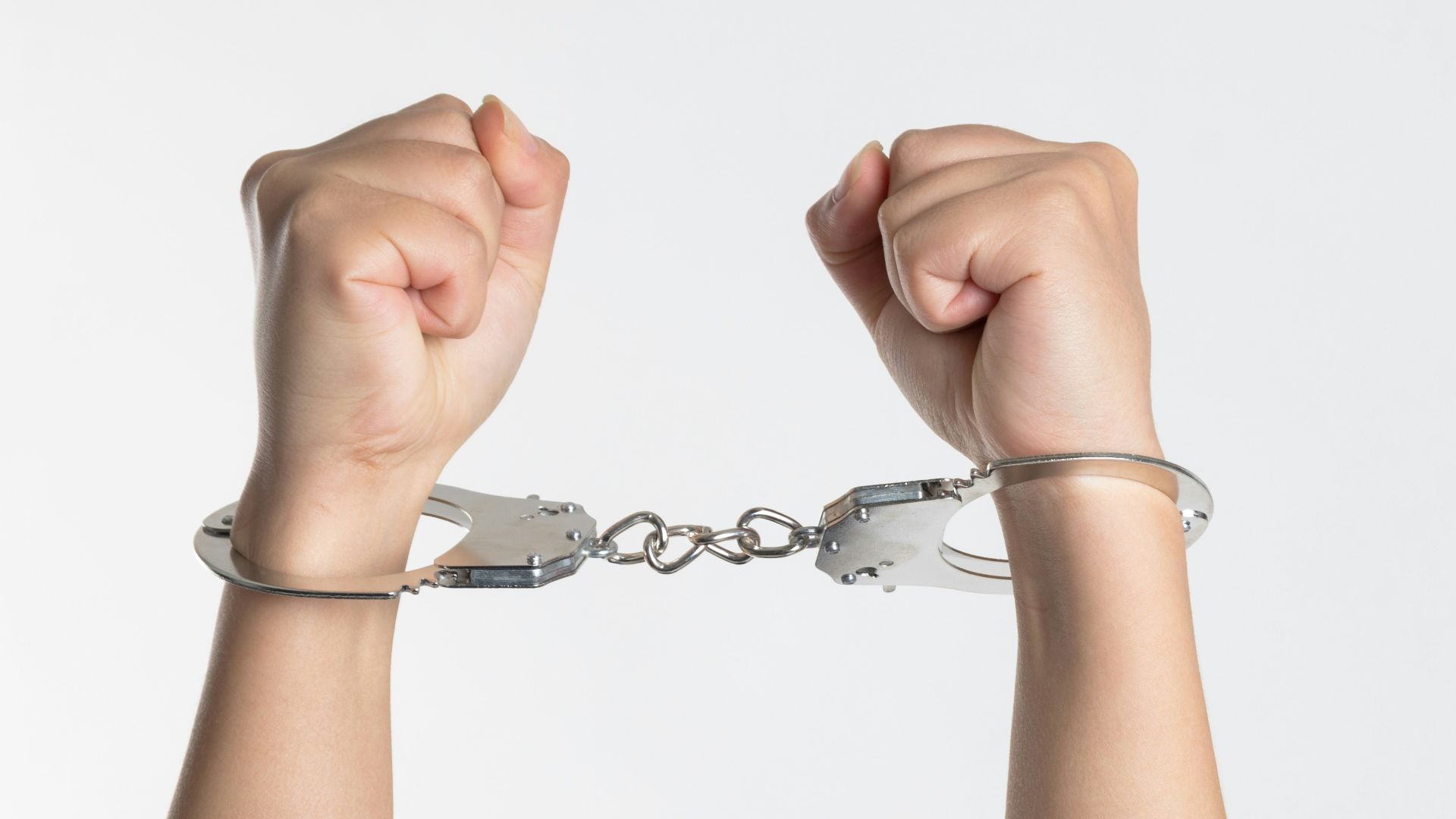 person showing handcuff