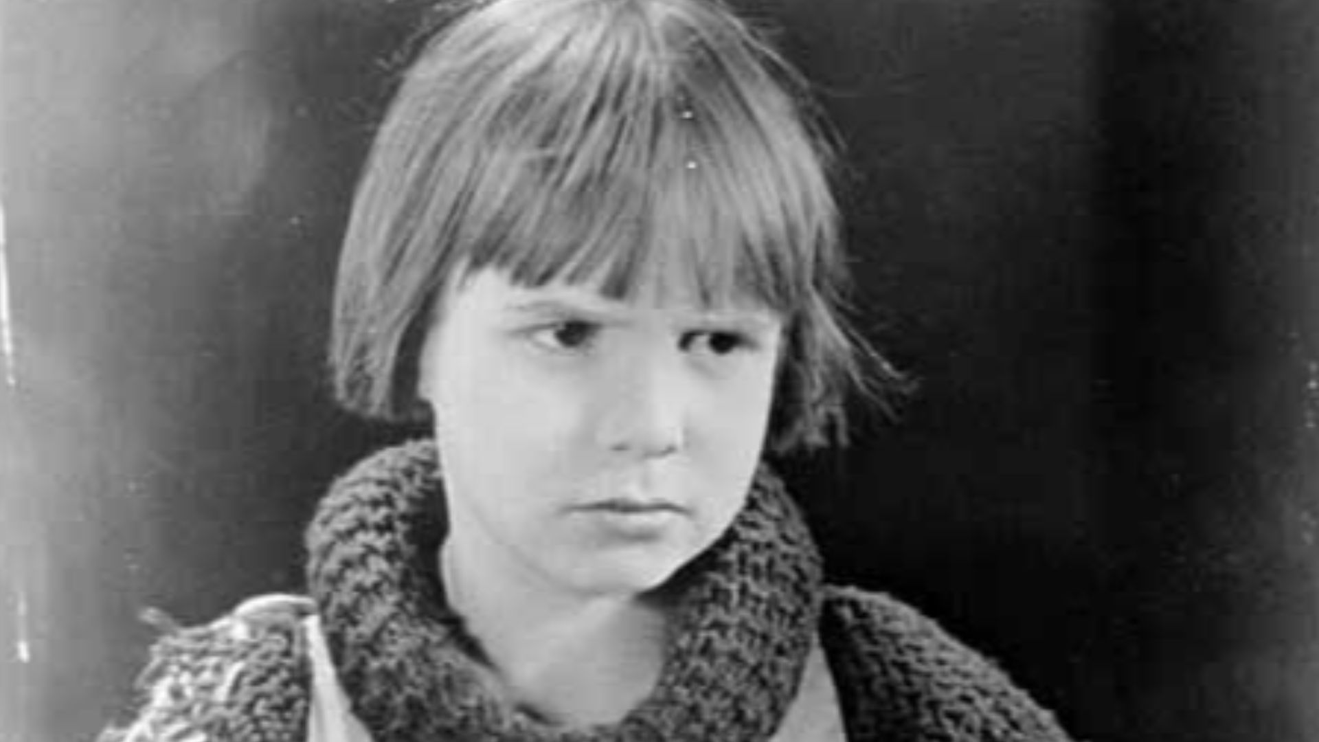 Handwritten on image: Best Wishes, Jackie Coogan
This image is probably a promtional studio photograph from