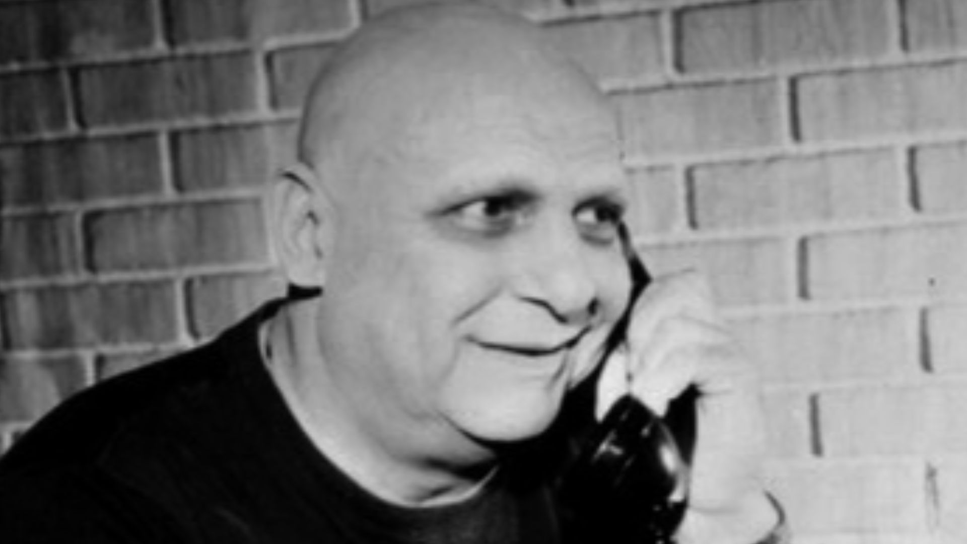 Publicity photo of Jackie Coogan as Uncle Fester from the television program The Addams Family.