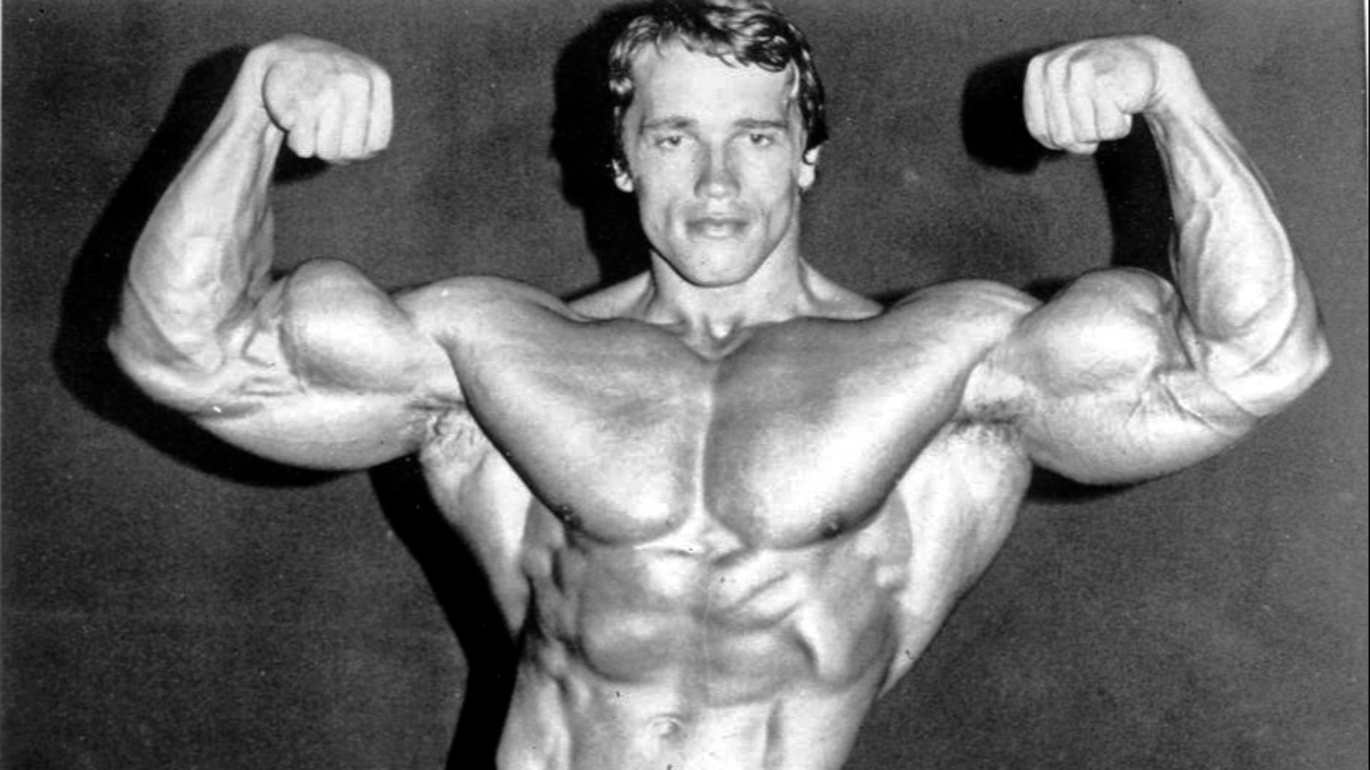 Photo of Arnold Schwarzenegger before defending the title for his fifth Mr. Olympia contest in 1974.