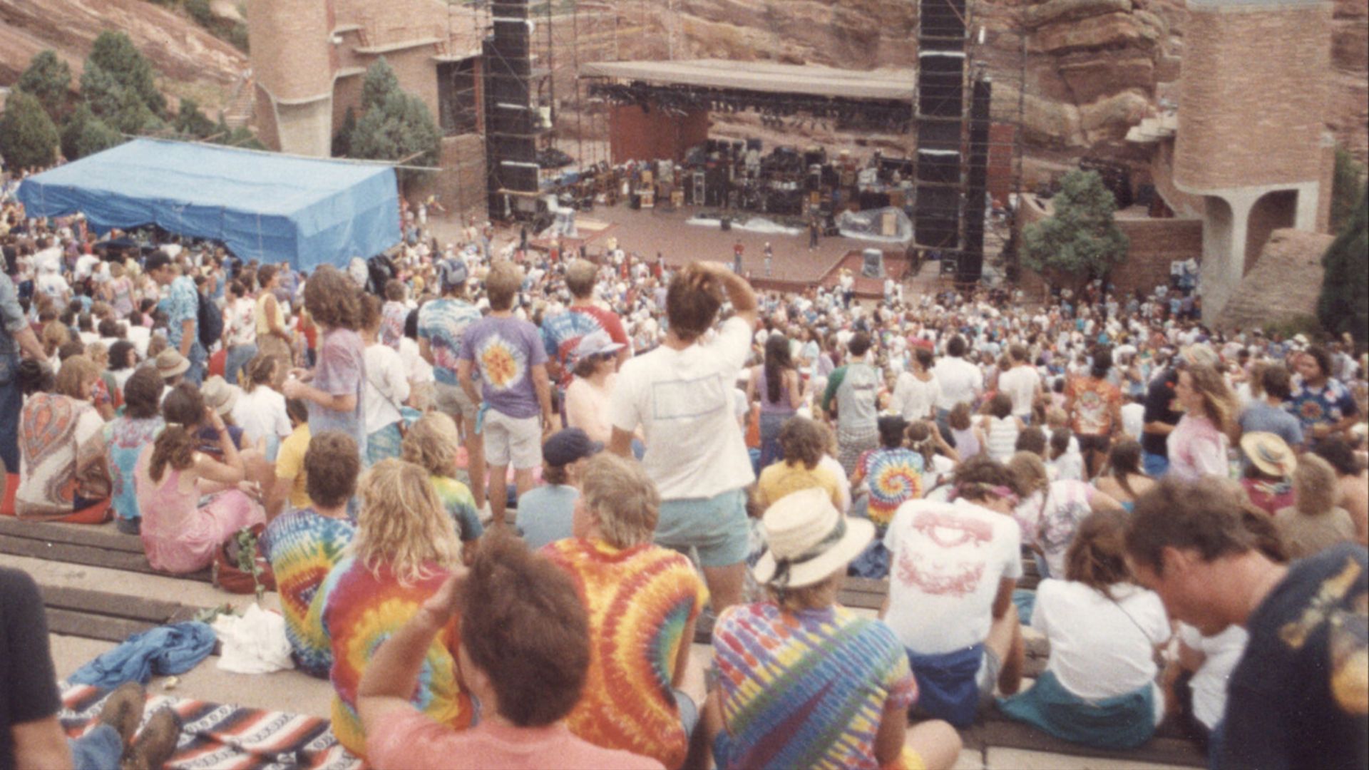 Grateful Dead at Red Rocks Amphitheatre in Morrison, Colorado, with deadheads waiting for concert to start/dancing