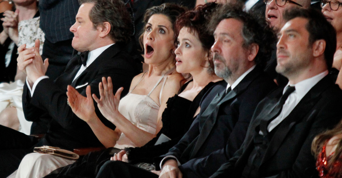 Actor Colin Firth and wife Livia Giuggioli react