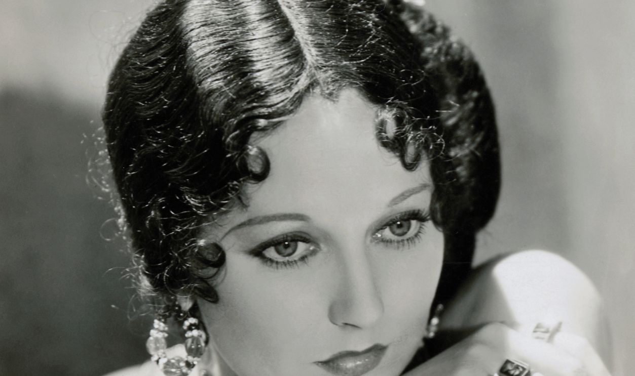  Thelma Todd (Original Caption) Thelma Todd, black wig and all, as Nellie Bly in Her Man, which Tay Garnett is directing for Pathe with Helen Twelvetrees in the leading feminine role.