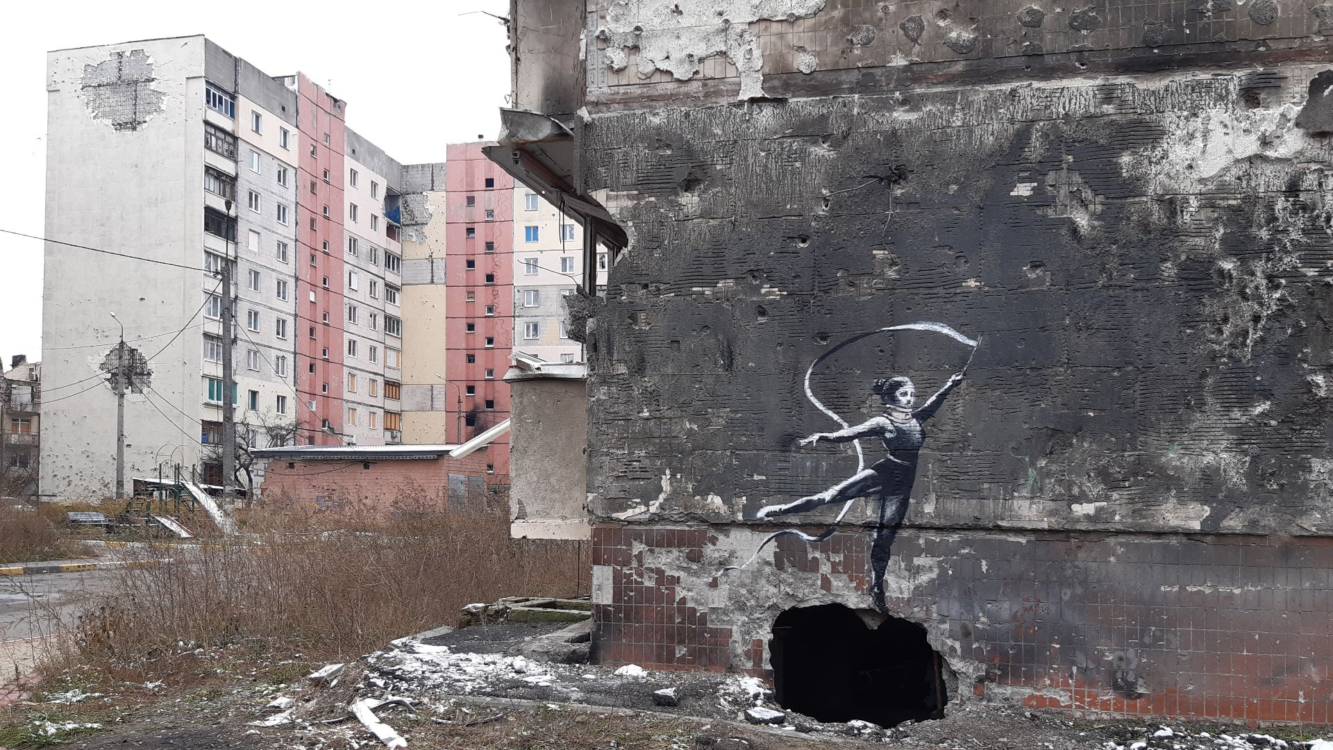 Banksy. A mural on the wall of a bombed building. Irpin, Ukraine