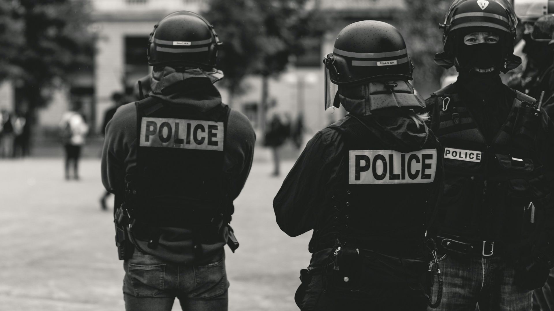group of police grayscale photo