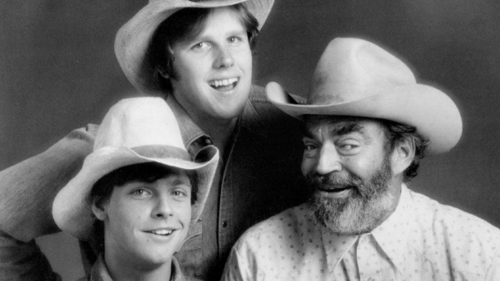 Photo of Gary Busey (standing), Mark Hamill and Jack Elam from the television program The Texas Wheelers.