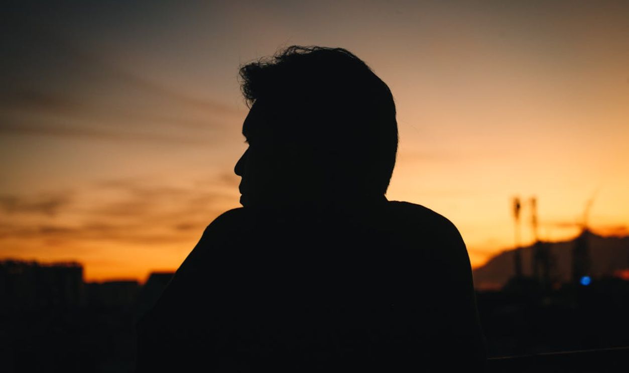 Silhouette of Person at Sunset Outdoors