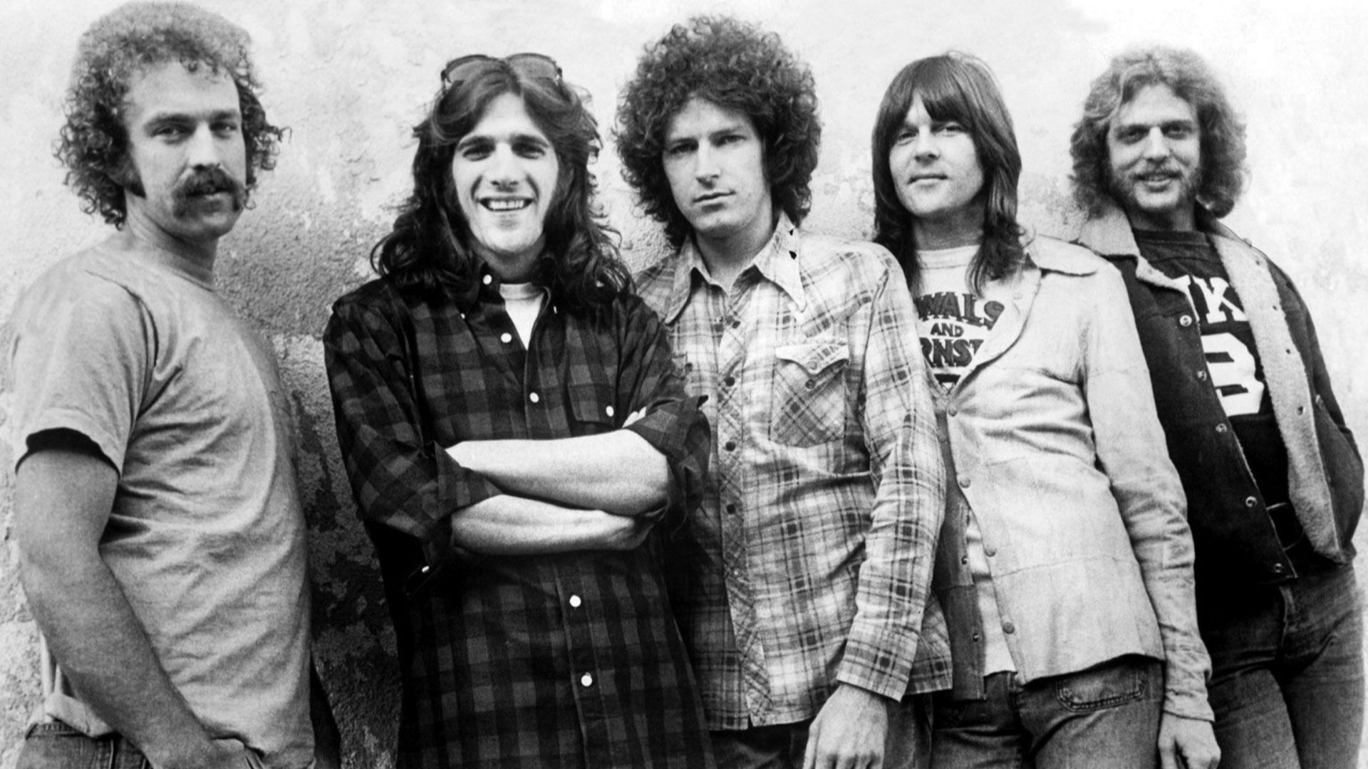 Press photo of the band Eagles by Asylum. Although no date is given, it dates from 1974 to 1975, as those were the only two years the lineup depicted was active. No copyright markings on the photo.