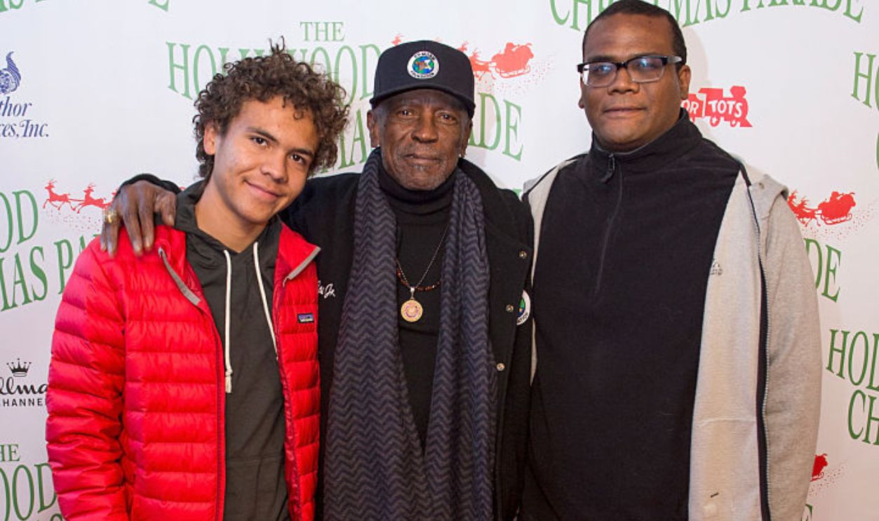 HOLLYWOOD, CA - NOVEMBER 27: (L-R) Malcolm Gossett, Actor Louis Gossett Jr. and son director/writer Satie Gossett attend the 85th Annual Hollywood Christmas Parade on November 27, 2016 in Hollywood, California.