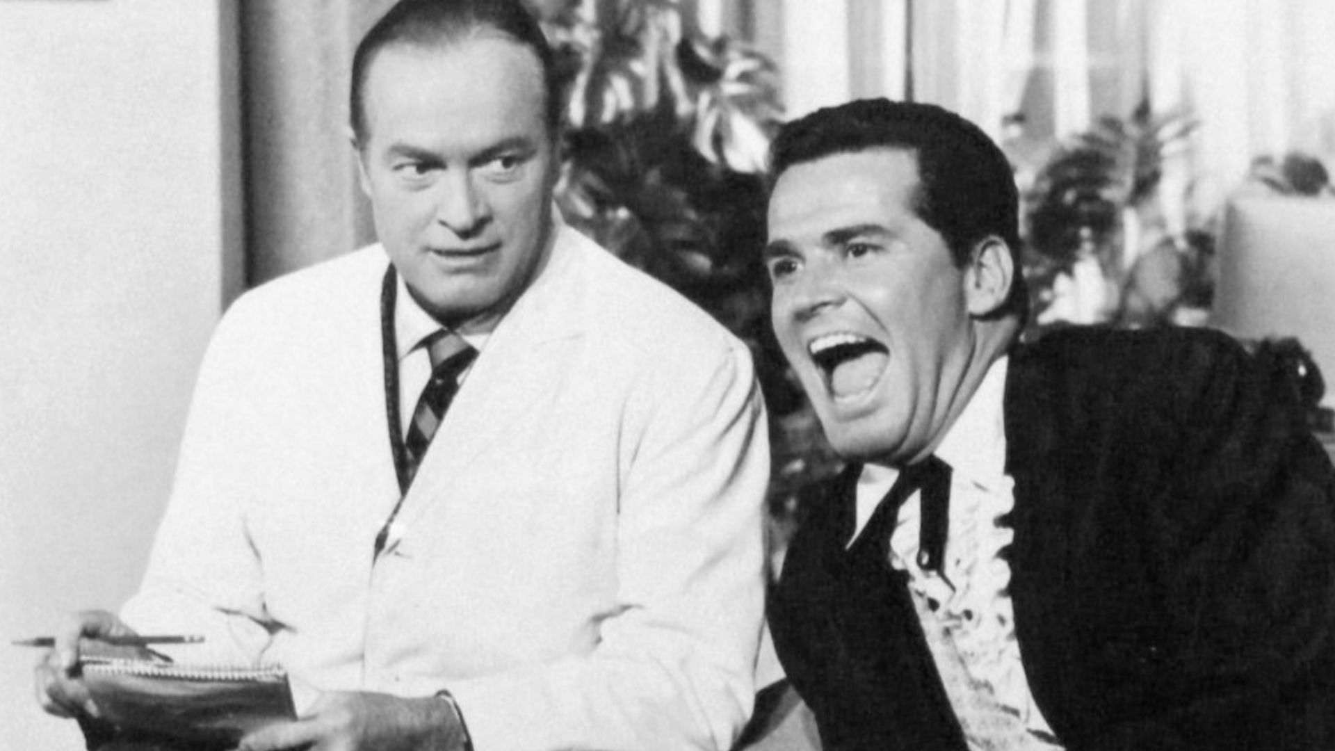 Photo of Bob Hope and James Garner rehearsing a skit for the television special The Bob Hope Buick Show.