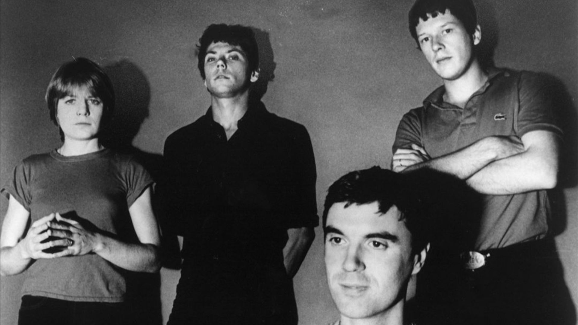 Musical group Talking Heads in a publicity photo from 1977. From left to right; Tina Weymouth, Jerry Harrison, David Byrne, and Chris Frantz.