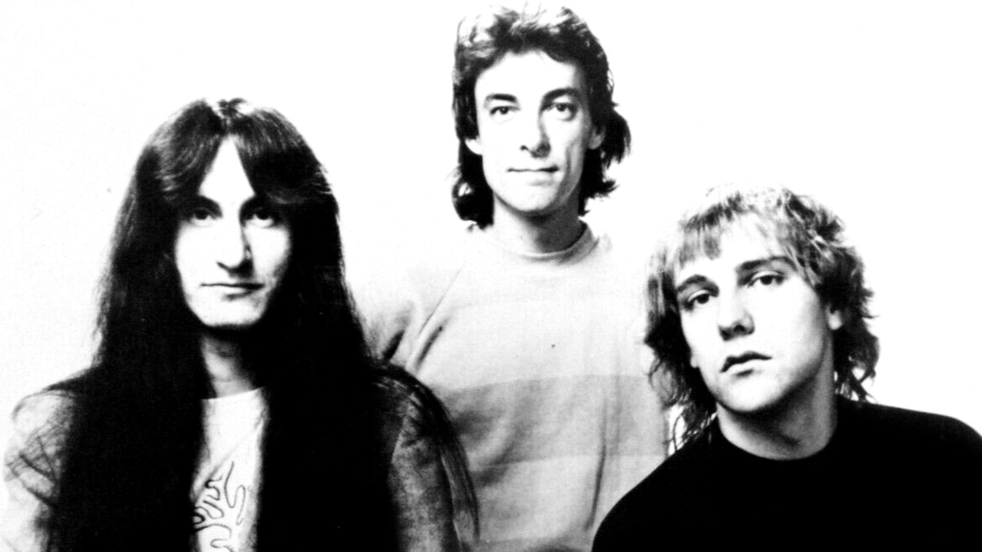 Promotional press photo of Canadian rock band Rush.