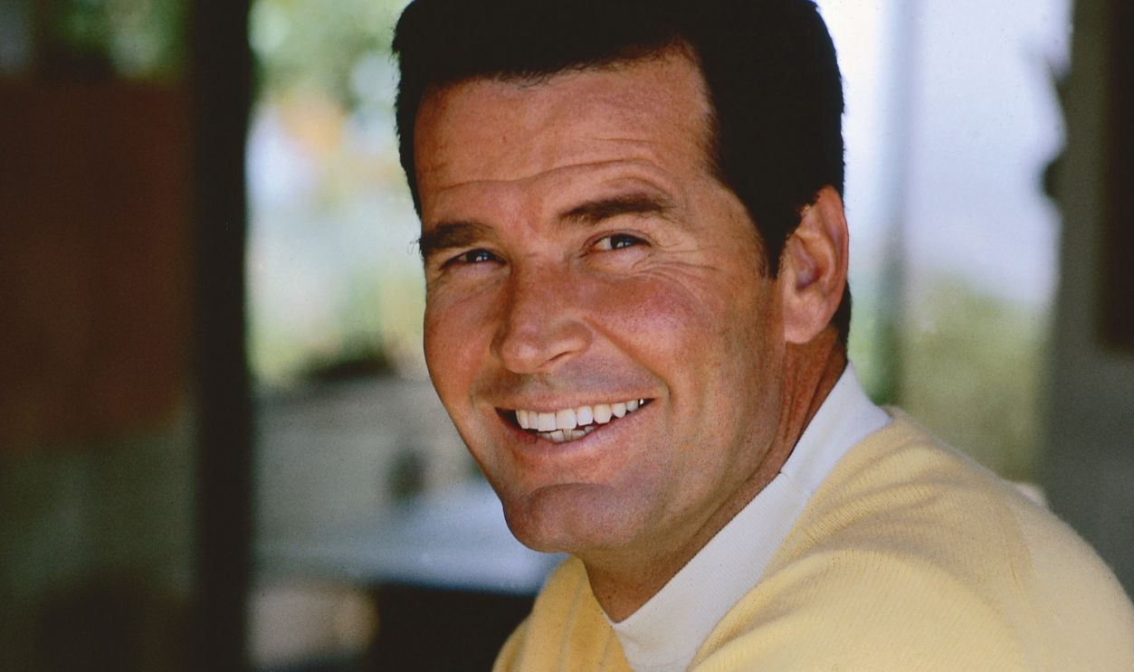 James Garner American actor James Garner wearing a lemon-yellow jumper, circa 1970.