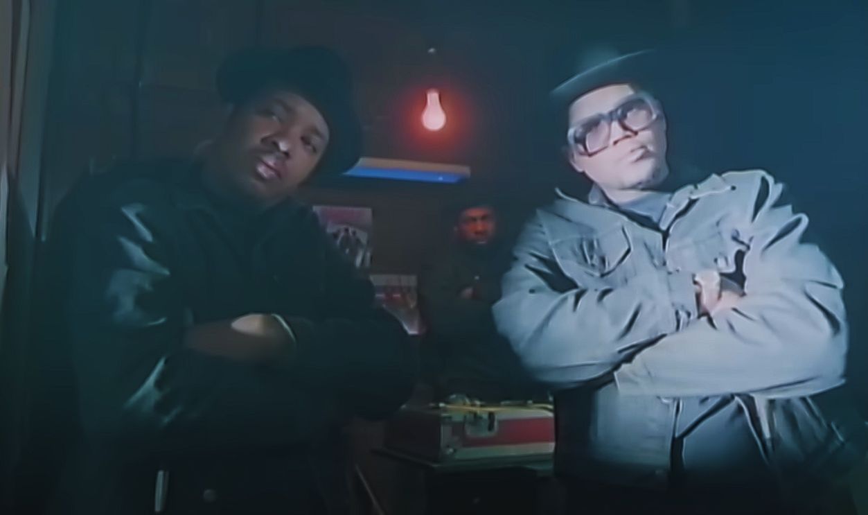 Screenshot from Run-D.M.C. ft. Aerosmith: Walk This Way (1986) 