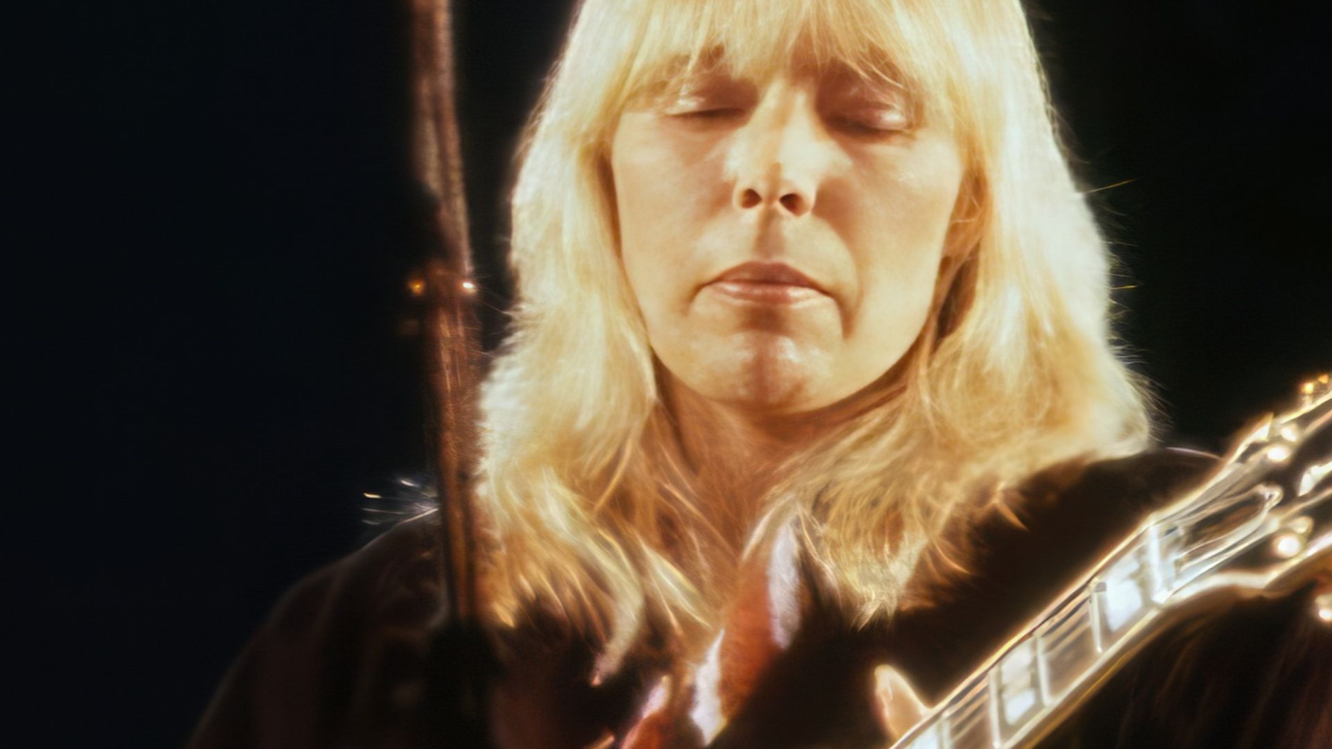 Joni Mitchell, performing in 1983