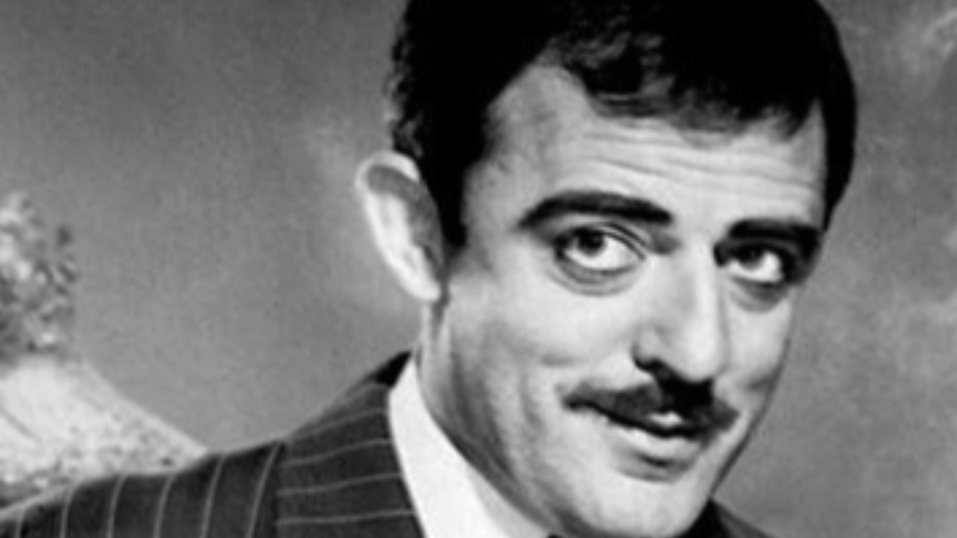 Publicity photo of Jon Astin as Gomez from the television program The Addams Family.