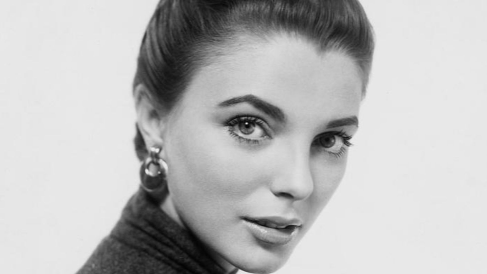 Joan Collins photographed for publicity purposes for The Good Die Young, 1955.