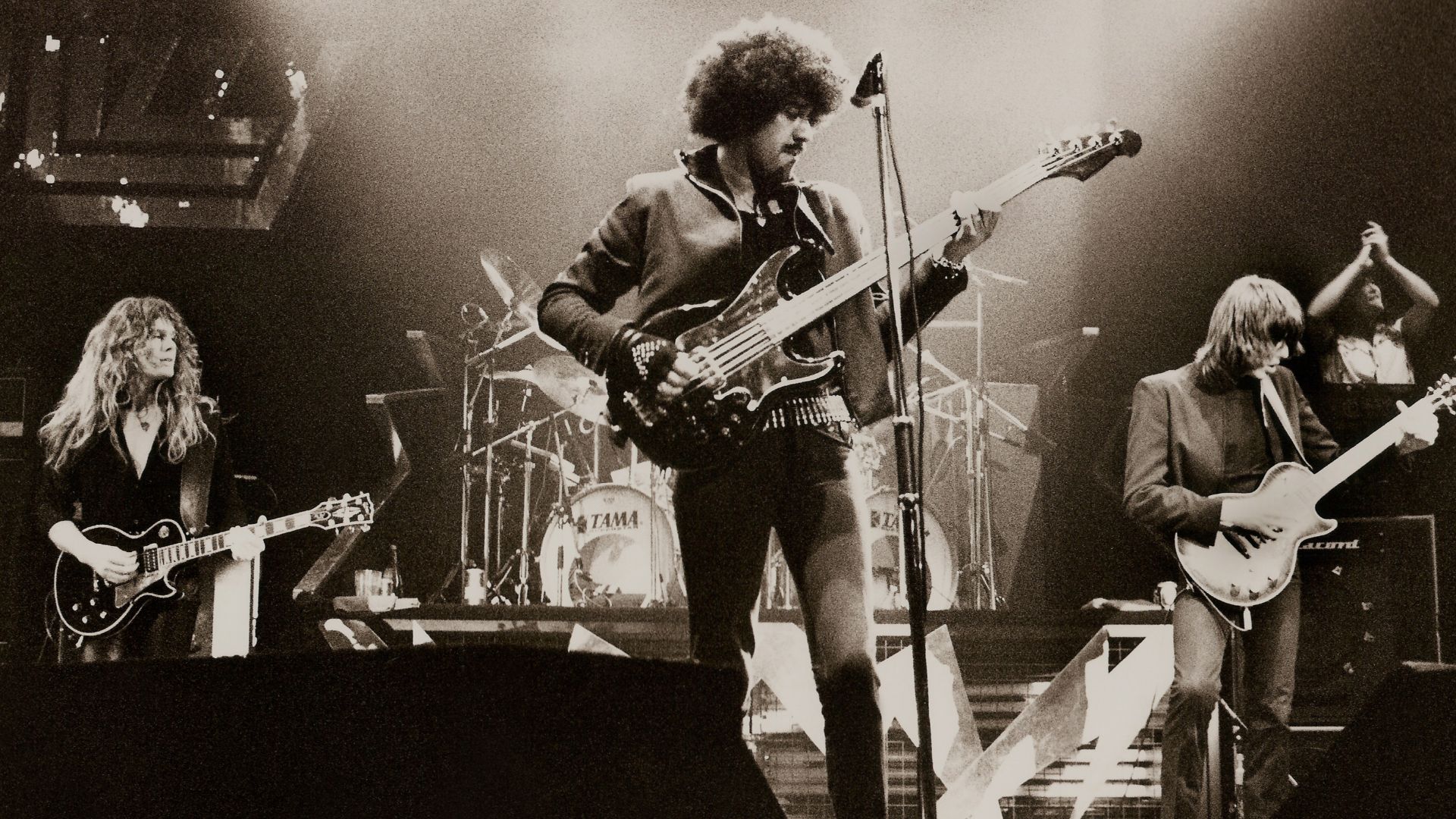 THIN LIZZY - Manchester Apollo - 1983. On the guitars from left: John Sykes, Phil Lynott (bass), Scott Gorham.