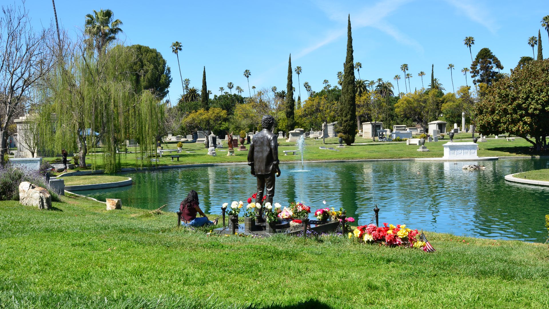 Grave of actor Anton Yelchin by the pond of Hollywood Forever Cemetery, Los Angeles, California.